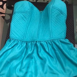 Strapless form fitted shirt with flare